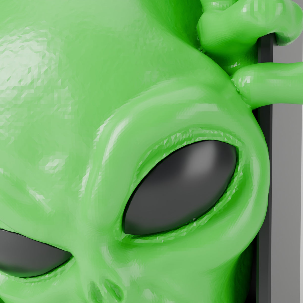 Alien book nook bookshelf insert green with black eyes detail close up