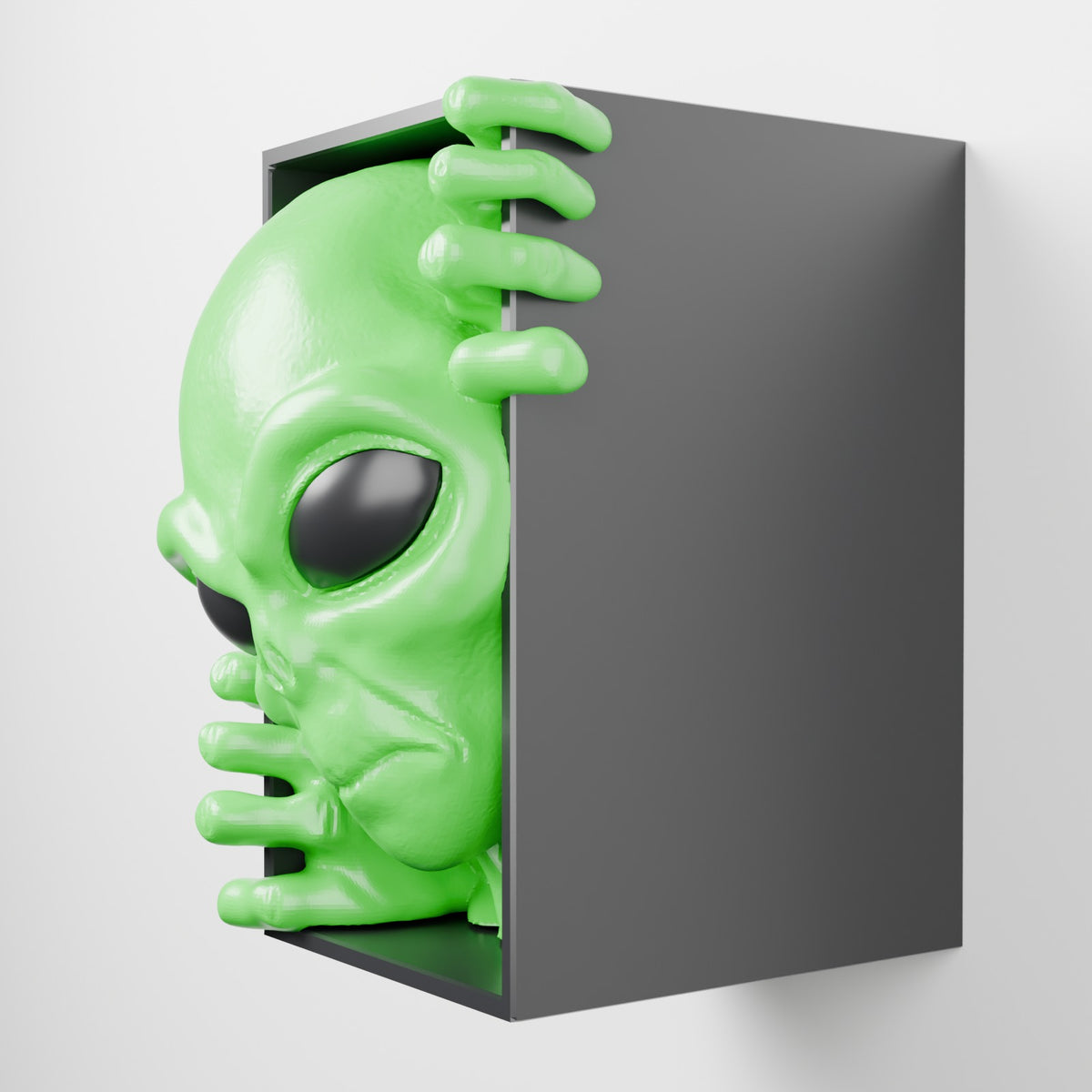 Alien book nook bookshelf insert green with black eyes on white wall side