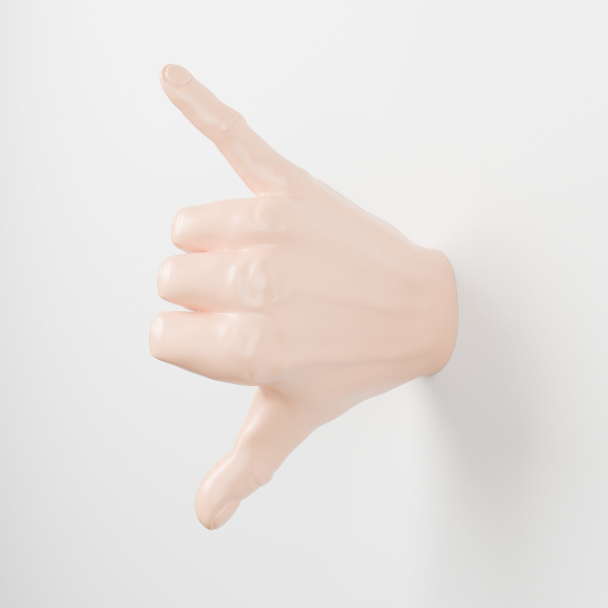 Shaka hand wall mount vertical peach on white wall side