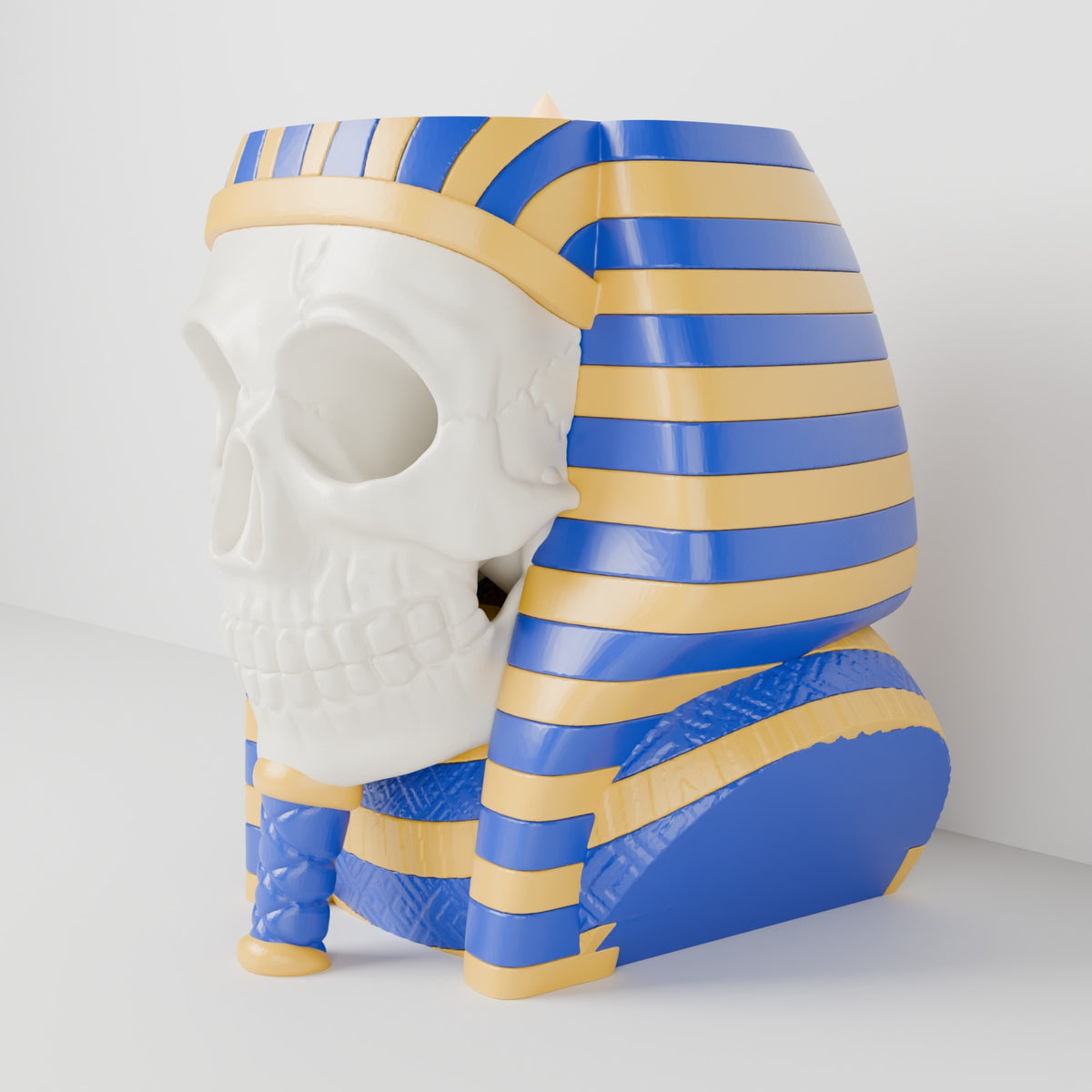 Skull pharaoh tealight holder lapis blue and gold on white shelf side
