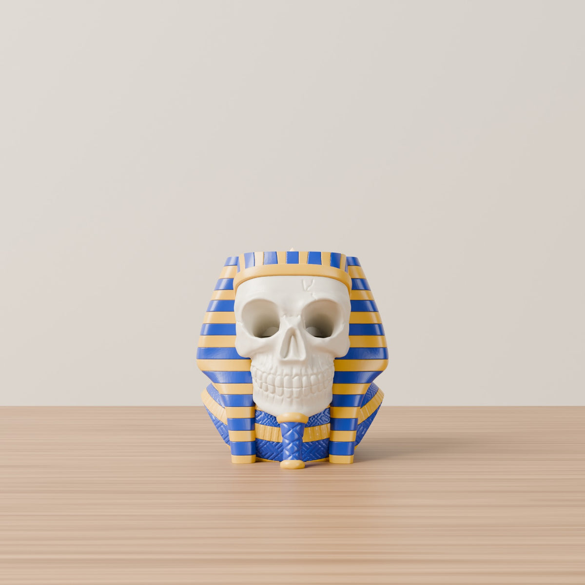 Skull pharaoh tealight holder lapis blue and gold on wooden table plain